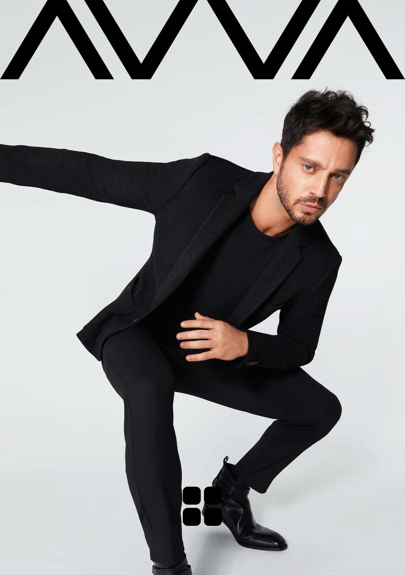 Key visual: Murat Boz in a black blazer, arm outstretched