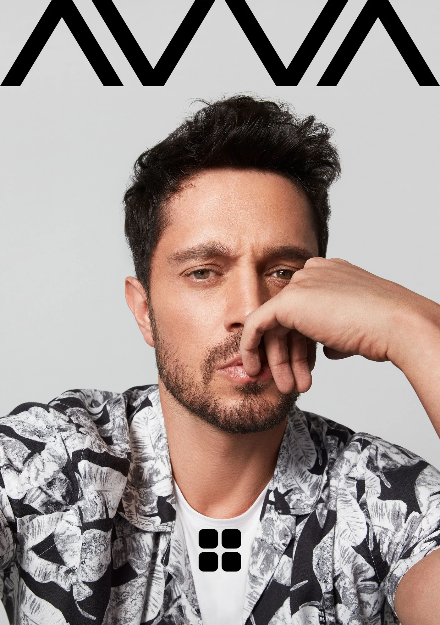 Key visual: Murat Boz in a black-and-white leaf-print shirt